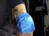 Get a Video with Sandra getting bound, gagged and spanked in her shiny nylon Shorts