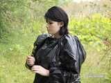 [From archive] Stella is walking in the forest in trash bag dress
