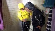 Watching sexy Stella and Sandra having fun with shaving cream and eachother both wearing shiny nylon rainwear (Video)