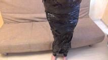 [From archive] Stella - Wrapped completely in black cling film (video)