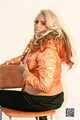 Lady Lana - special orange Adidas Downjacket with fur hood