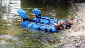 Dana and Asya - both ends up packed in trash bags in the water (video)