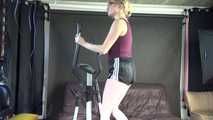 *** Sexy MIA wearing a black shiny nylon shots and a purple top during her workout on the cross trainer (Video)***