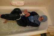 Watching Stella being tied and gagged with ropes and a cloth gag in a bathtub diving under water (Pics)