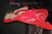 ***NEW MODELL COURTNEY*** wearing a sexy black shiny nylon rain pant and several shiny nylon raincapes in different colours (Pics)