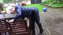 Watching sexy Courtney feeling comfortable in her dark blue  shiny nylon rainwear cleaning the table outside (Video)
