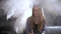 Ksenia is making a lot of nose exales while smoking vape