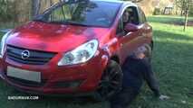Mistress Cleo smokes and smashes balls with a car