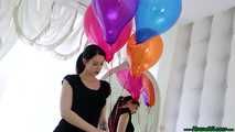 elegant nailpoppings with a bunch of helium balloons