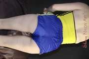 ***NEW MODELL MIA*** wearing a sexy yellow/blue shiny nylon shorts and a yellow top preparing her bed and changing cloths (Pics)