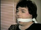 25 Yr OLD 2nd GRADE SCHOOL TEACHER GETS TAKEN HOSTAGE, HANDGAGGED, MOUTH STUFFED OTM GAGGED CLEAVE GAGGED, & CHAIR TIED  (D62-4)