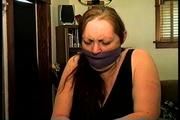 46 Yr OLD REAL ESTATE AGENT'S IS MOUTH STUFFED, HANDGAGGED, CLEAVE AND OTM VET TAPE GAGGED, BALL-GAGGED, CLEAR TAPE GAGGED WITH HANDS TIGHTLY TIED WITH THIN RAWHIDE (D72-5)