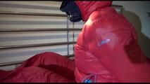 Jill tied, gagged and double-hooded on a bed wearing sexy shiny nylon rain pants and a down jacket (Video)
