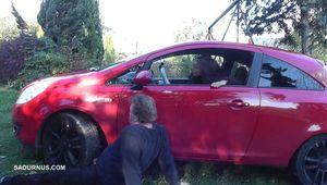 Mistress Cleo smokes and smashes balls with a car