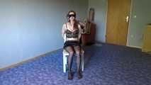 Shelli cuffed and gagged on a chair 1/2