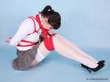 Rozanka - Leggy brunette rocks a schoolgirl uniform during her bondage shoot