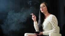 Watch lovely Tanya lighting up and smoking a 120mm Cigaronne