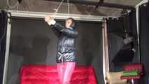 Watching sexy Pia being tied and gagged overhead with ropes and a clothgag wearing a sexy red/black crazy sensation combination (Video)