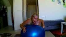  blue bouncy ball ridden off in a bikini