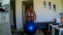  blue bouncy ball ridden off in a bikini