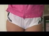 Sexy Alina wearing a sexy white shiny nylon shorts and a pink top lolling at home (Video)