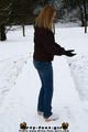 Linda with white clogs in the snow