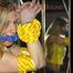 ***HOT HOT HOT***Sandra wearing supersexy blue/yellow shiny nylon shorts and a yellow top tied and gagged over head with ropes and cloth gag (Pics)