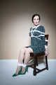 Sophia Smith in Green dress Chair tied