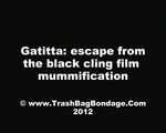 Gatitta: Flucht aus dem schwarzen Klarsichtfolie Mumifizierung
