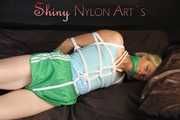 SEYX SONJA being tied and gagged with ropes and a clothgag wearing a sexy green shiny nylon shorts and a blue shirt (Pics)