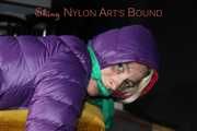 Watching sexy Sonja being tied and gagged with ropes and a cloth gag on a stool wearing a sexy shiny nylon rain pant and a purple down jacket (Pics)