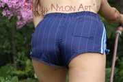 Watching Aiyana wearing only a sexy blue shiny nylon shorts watering the garden (Pics)