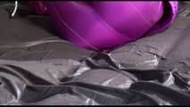 PIA tied and gagged with ropes and cloth gag on a sofa wearing an sexy oldschool purple/pink skisuit (Video)