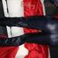 Watching Sonja wearing a black shiny nylon rain pants and a shiny nylon rain jacket preparing bed (Pics)