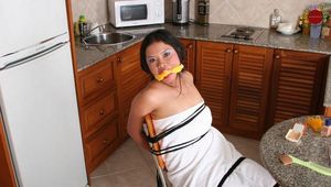 Asian Girl Dom is Tied on the Chair Wearing only a towel
