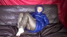 *** Watching sexy SONJA during changing her clothes into a sexy brown shiny nylon down pants and a sexy blue shiny nylon down jacket lolling on the bed (video)***