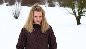 Linda with white clogs in the snow