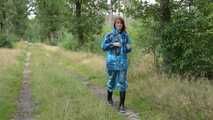 Miss Petra goes for a walk in PVC raingear and rubber boots