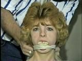 18 YEAR OLD CUTIE FACE TERRI IS MOUTH STUFFED, CLEAVE GAGGED, ROPE GAGGED, CROTCH ROPED, TIED UP WEARING LINGERIE AND BAREFOOT (D56-6)