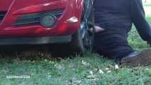 Mistress Cleo smokes and smashes balls with a car