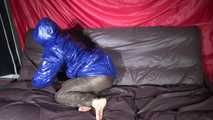 *** Watching sexy SONJA during changing her clothes into a sexy brown shiny nylon down pants and a sexy blue shiny nylon down jacket lolling on the bed (video)***