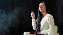 Watch lovely Tanya lighting up and smoking a 120mm Cigaronne