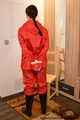 Bondage in  red nylon rainwear