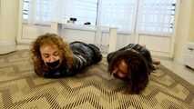 Terry and Vanessa - Trash bag games: both girls are packed in trash bags on the floor (video)