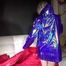 Sexy Sonja preparing her bed wearing sexy shiny nylon shorts and a long rain jacket (Video)