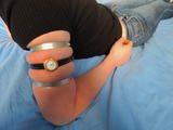 Tight metal hose clamps and a little wrist watch for Leas soft upper arms