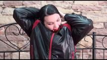 Jill ties and gagges herself sitting on a princess bed in an old cellar wearing sexy black shiny nylon down wear (Video)