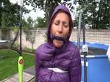 Watch Sandra bound and gagged in her shiny nylon Downjacket nylon hooded.