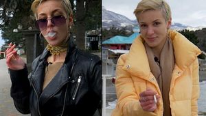 Short cut hair blonde girl is smoking two cork cigarettes