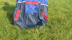 Jill wearing supersexy shiny nylon rainwear and a rain cape posing outdoor in the field (Pics)